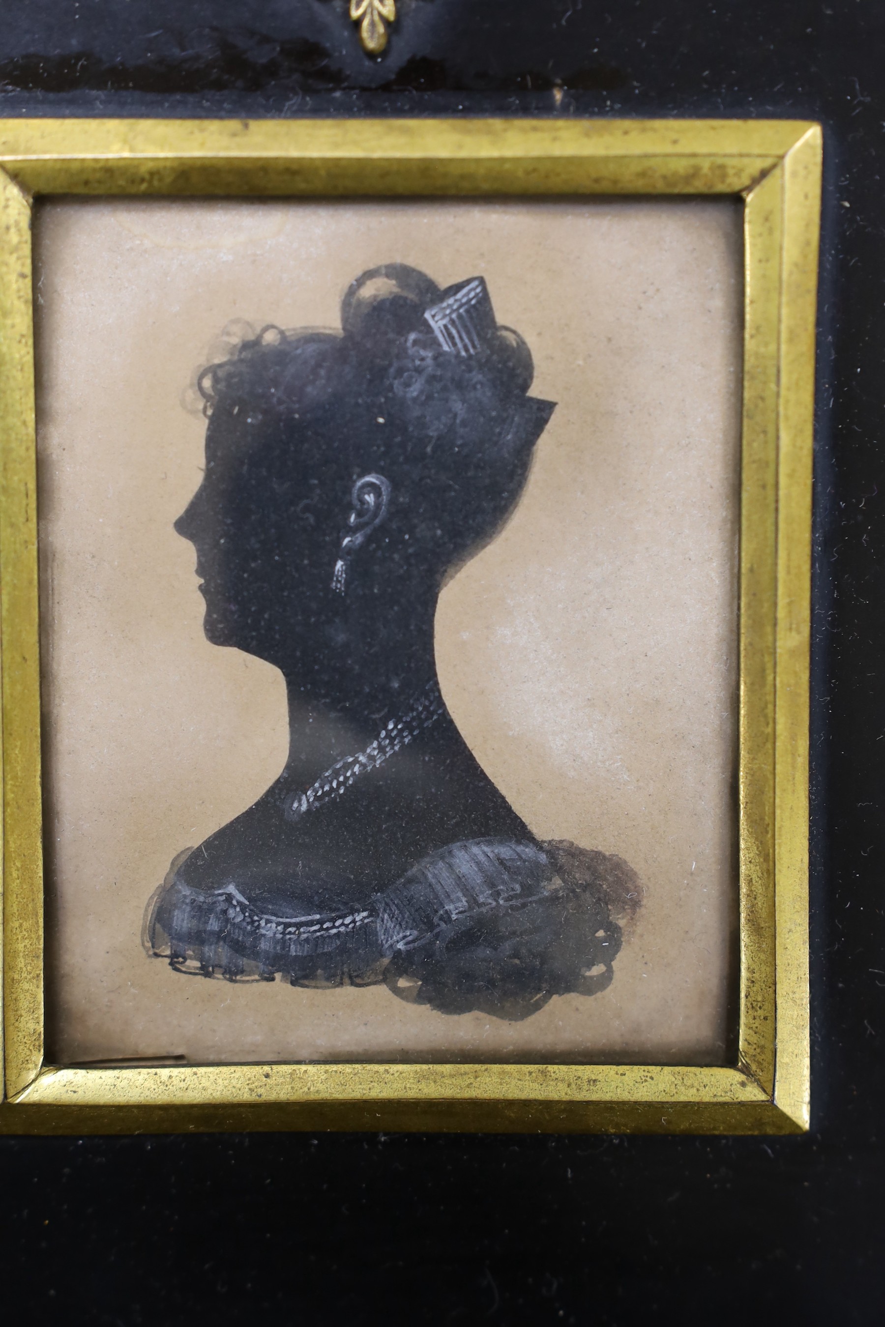 Four Victorian painted and cut paper silhouettes of Colonel John Campbell and other members of his family